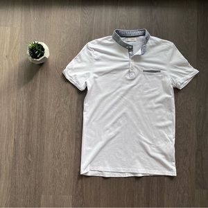 Celio White Short-Sleeve Polo Shirt With Grey Collar and Accent Pocket